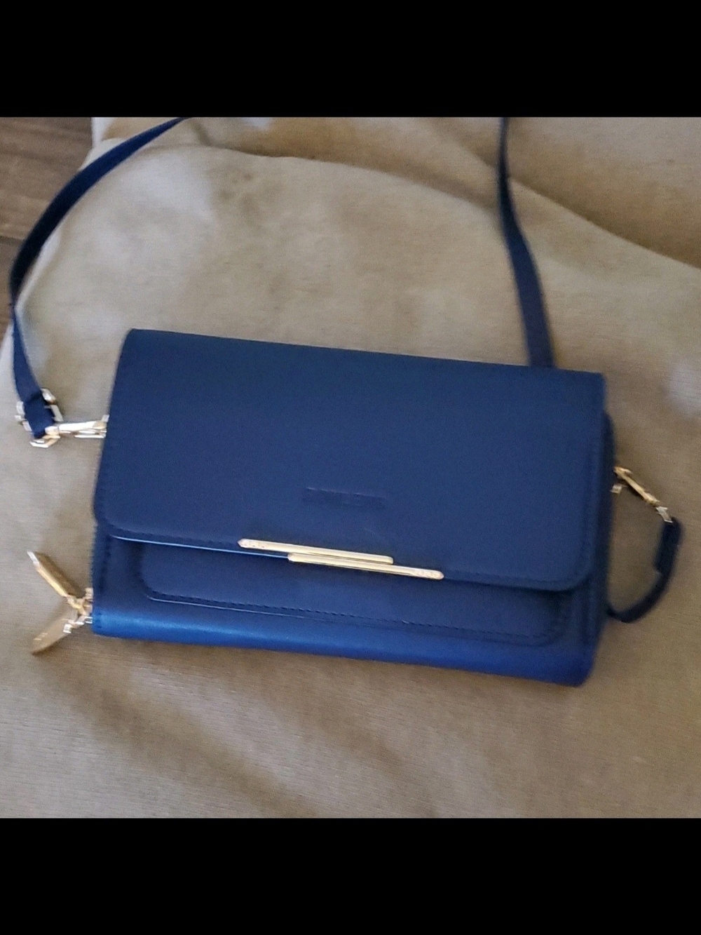 Sleek Royal Blue Crossbody Wallet with Gold Accent